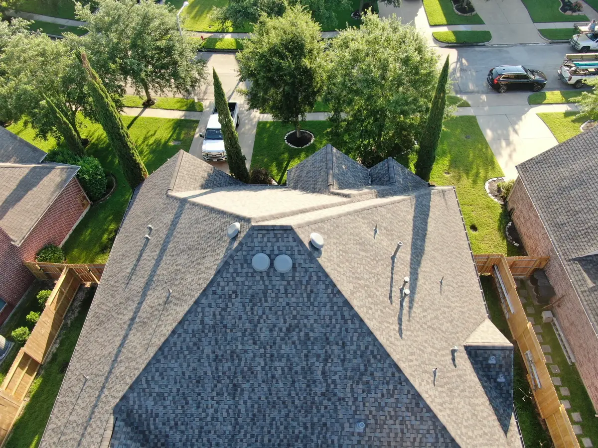 Downward aerial view of Kraft Roofing full roof replacement project - shingles
