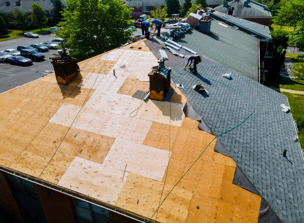 aerial view of roof deck and sheathing layer underneath shingles