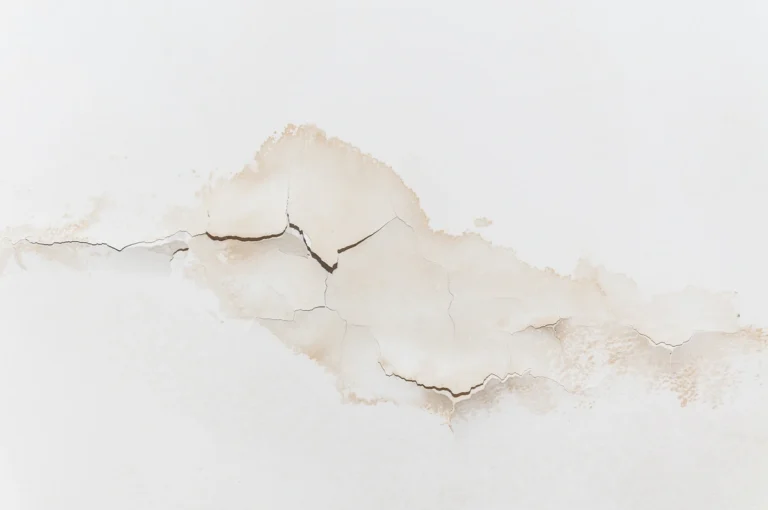 ceiling leak damaging ceiling and causing stains
