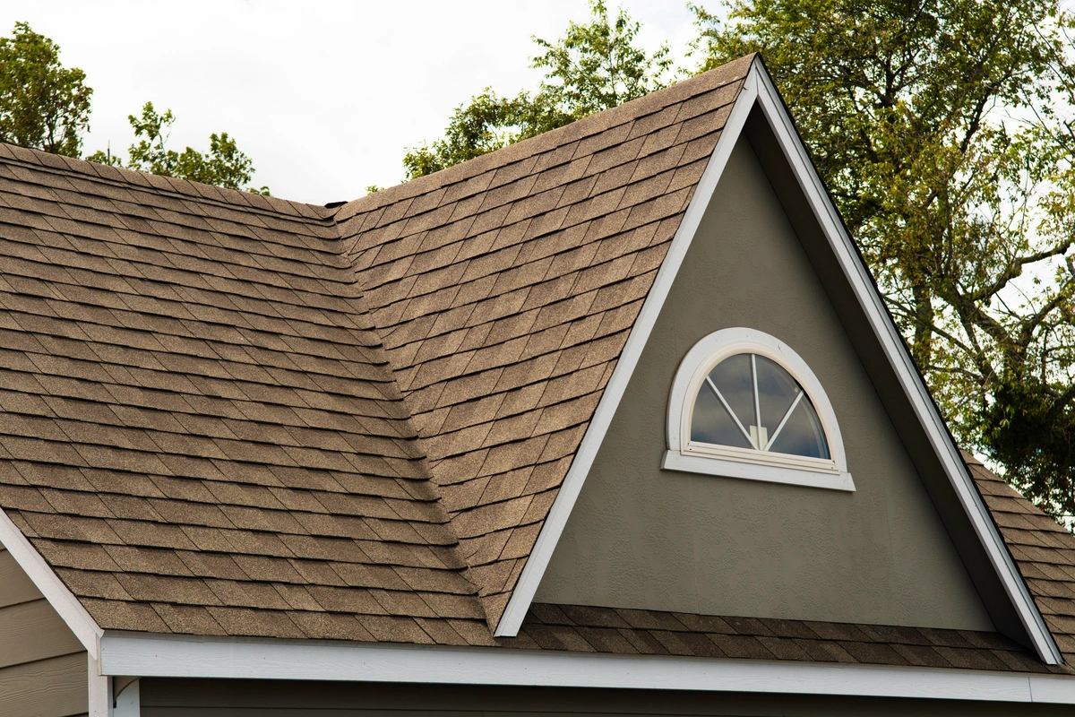 composition shingles-brown house with brown shingles