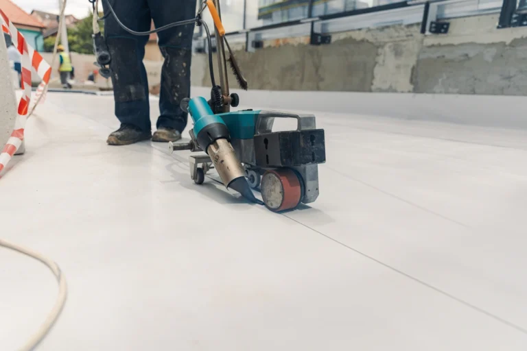 how to install tpo roofing-technician pushing machinery to install tpo roofing