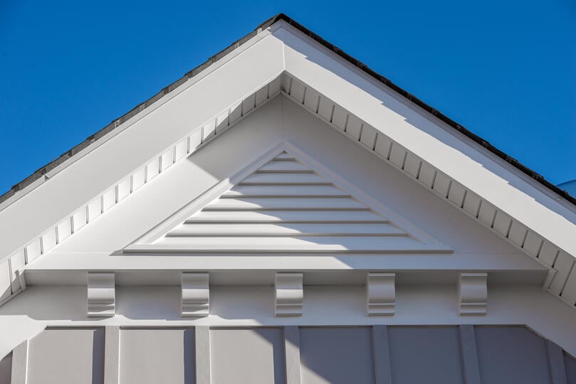 how to install soffit vents in attic-white soffits and vents near the peak of a home
