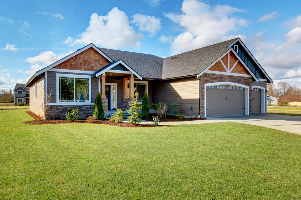 does a new roof increase home value-wood, stone, and siding on house with new roof