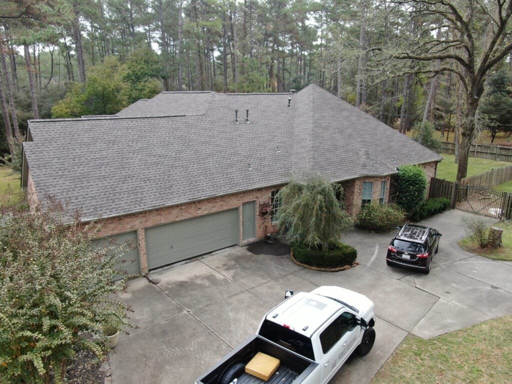 house roof with new asphalt shingles