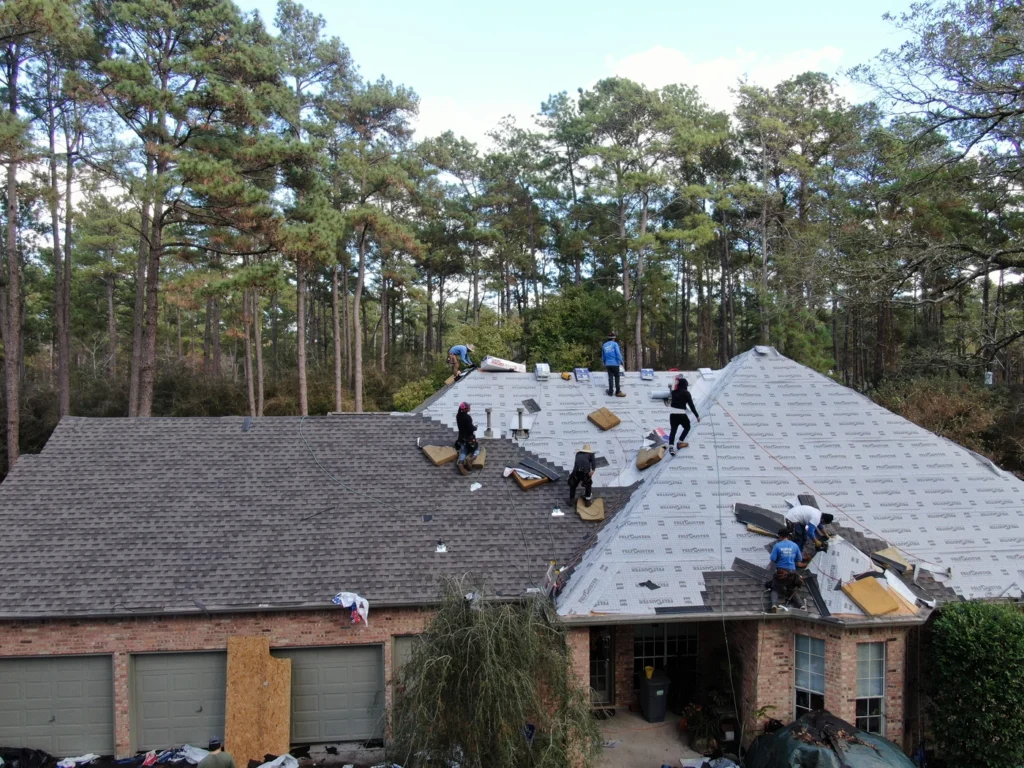 montgomery roofing contractors install new roof with asphalt shingles