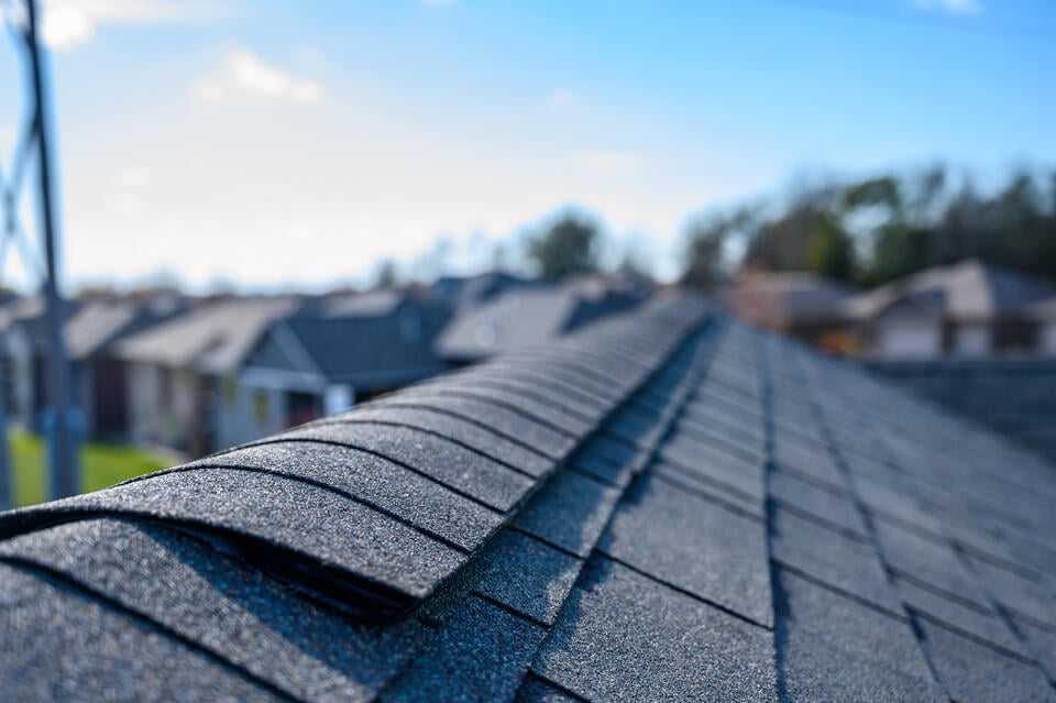 how to install ridge cap shingles-close up of ridge cap shingles on roof