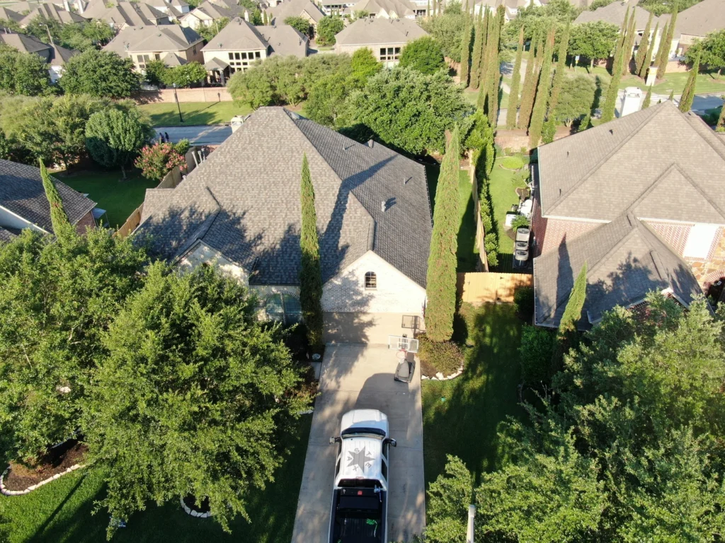 aerial view of cypress roofing project new roof replacement by kraft roofing with asphalt shingles